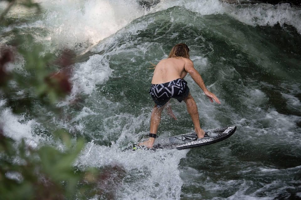 Munich: Eisbachwelle River Surfing Experience - Equipment choices that help beginners: soft tops and 5 mm hooded wetsuits